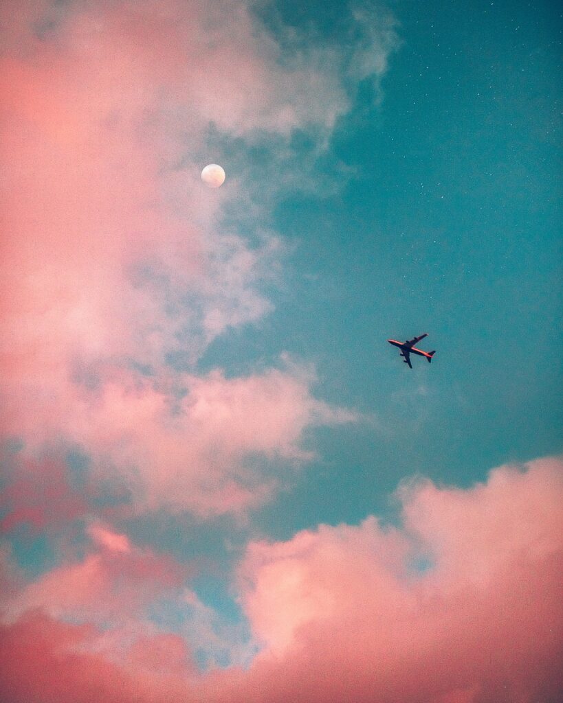 small airplane, colorful clouds