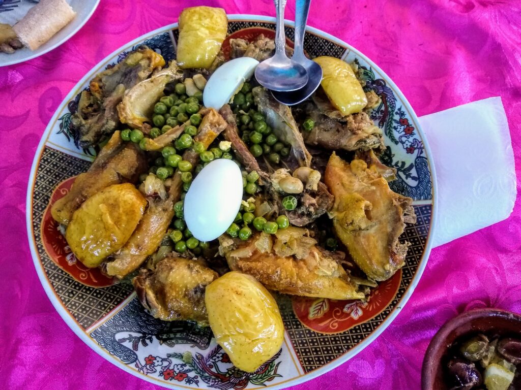 chicken tajine with peas, veggies, and eggs