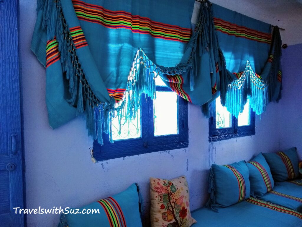 Beautiful, colorful turquoise and red interior of Fatima and Mohammed's house