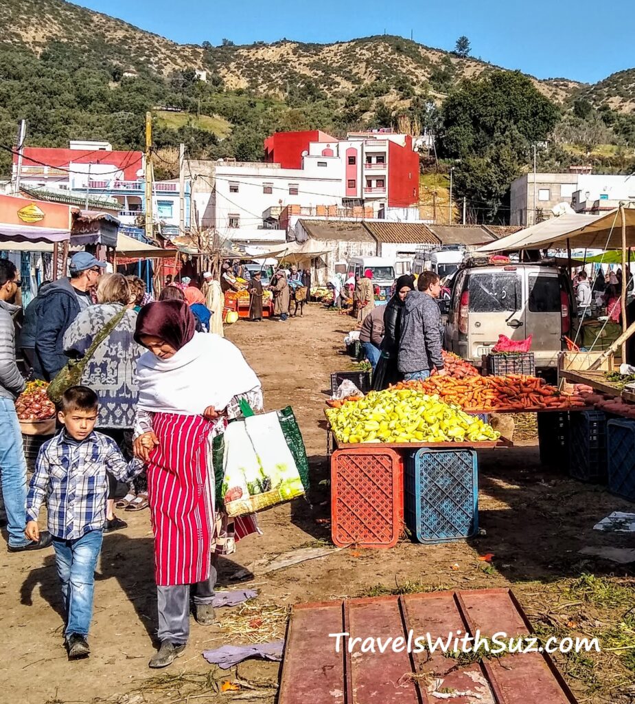A rural souk outside of Chefchaouen, selling vegetables and household items. Families are here.
