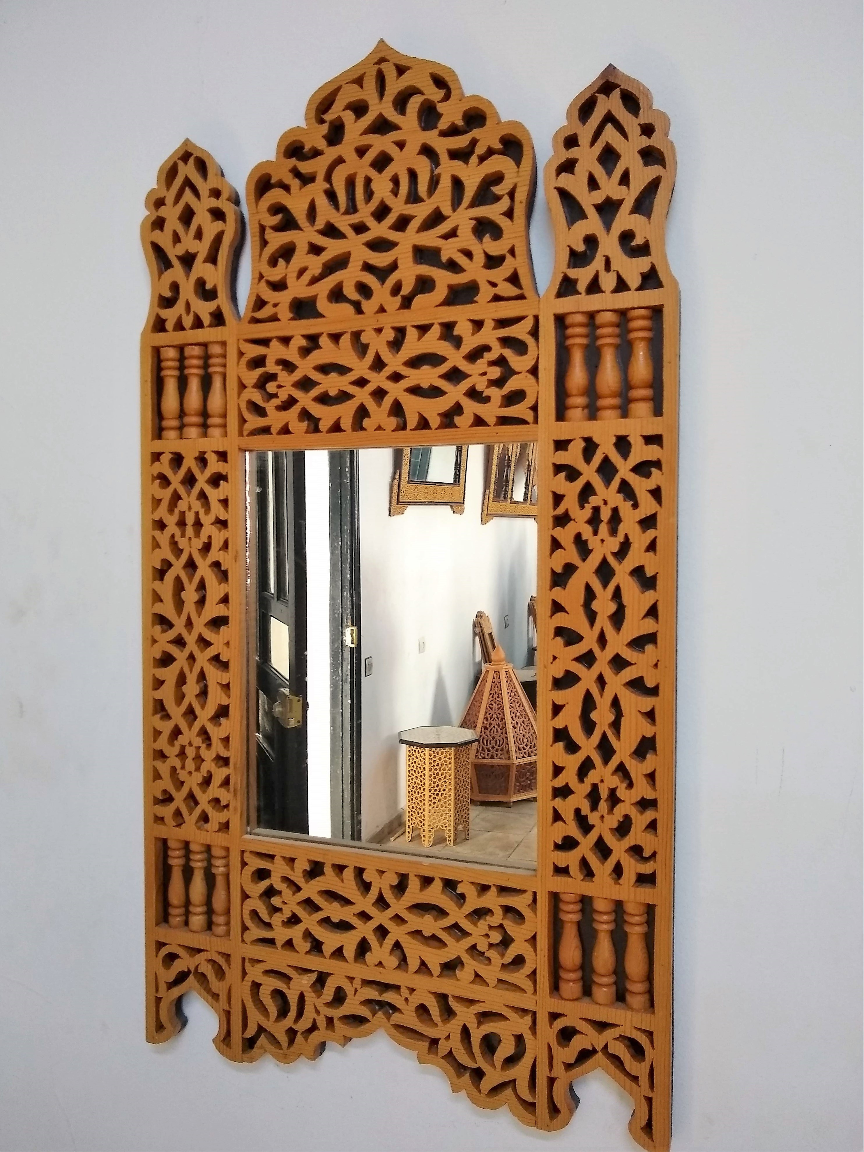 Beautiful wood cutout mirror at Dar Sanaa Traditional Arts School in Tetouan, Morocco